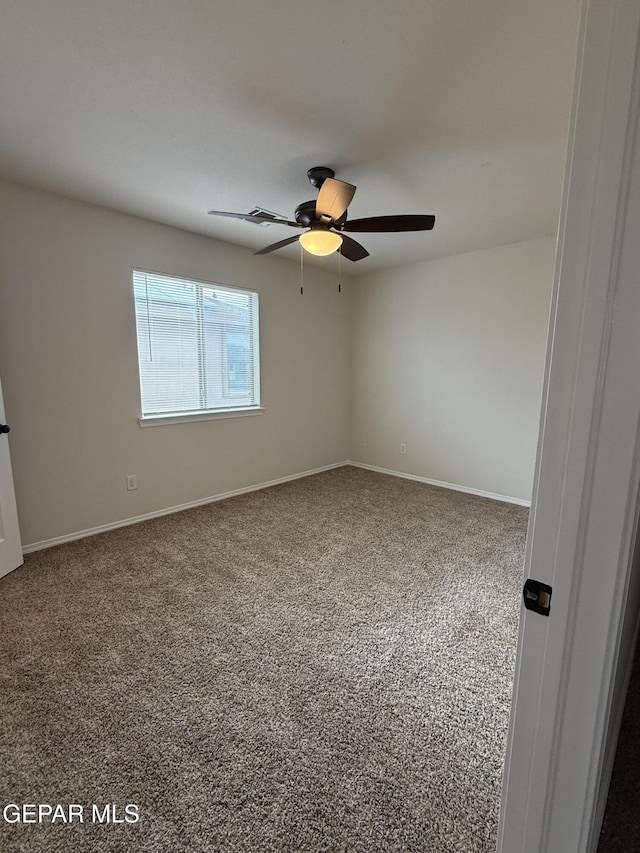 14368 N Cave Dr, El Paso, TX 79938 - empty room featuring baseboards, a ceiling fan, and carpet