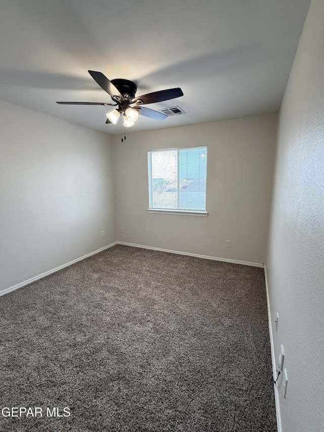 14368 N Cave Dr, El Paso, TX 79938 - spare room with visible vents, baseboards, a ceiling fan, and carpet