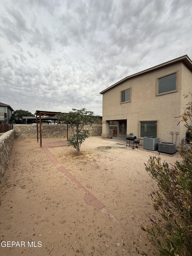 14368 N Cave Dr, El Paso, TX 79938 - exterior space featuring cooling unit and fence