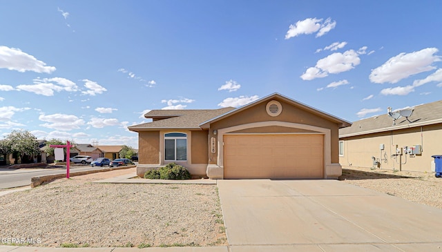 12729 Raul Mendiola Ln, El Paso, TX 79938 - single story home featuring stucco siding, an attached garage, and driveway