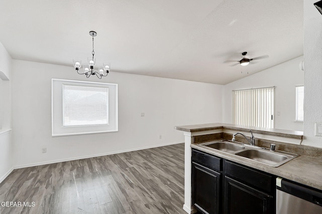 12729 Raul Mendiola Ln, El Paso, TX 79938 - kitchen featuring stainless steel dishwasher, a sink, dark cabinets, wood finished floors, and ceiling fan