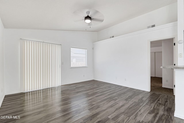 12729 Raul Mendiola Ln, El Paso, TX 79938 - unfurnished living room featuring wood finished floors, ceiling fan, and vaulted ceiling