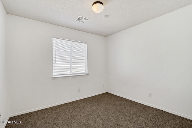 12729 Raul Mendiola Ln, El Paso, TX 79938 - unfurnished room with dark colored carpet and baseboards