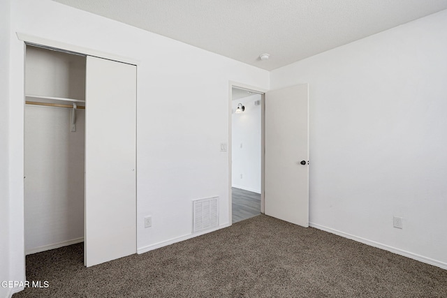 12729 Raul Mendiola Ln, El Paso, TX 79938 - unfurnished bedroom with carpet flooring and a closet