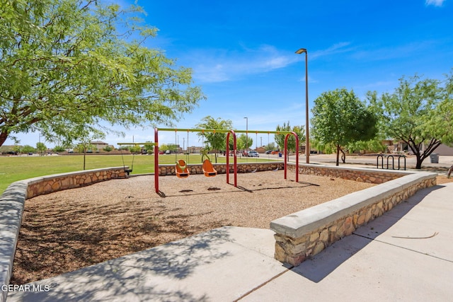 12729 Raul Mendiola Ln, El Paso, TX 79938 - communal playground featuring a yard
