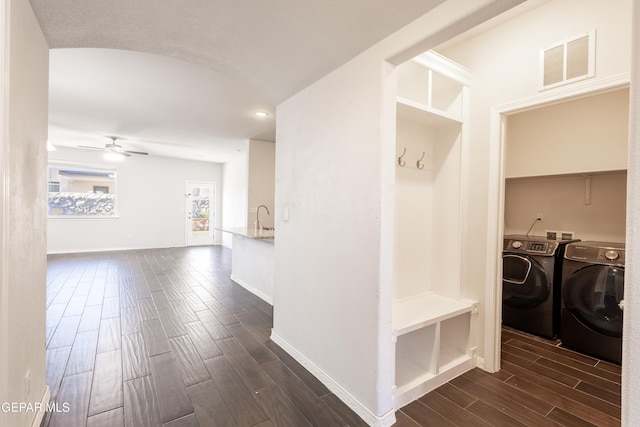 mudroom with separate washer and dryer, dark wood-type flooring, ceiling fan, a sink, and recessed lighting