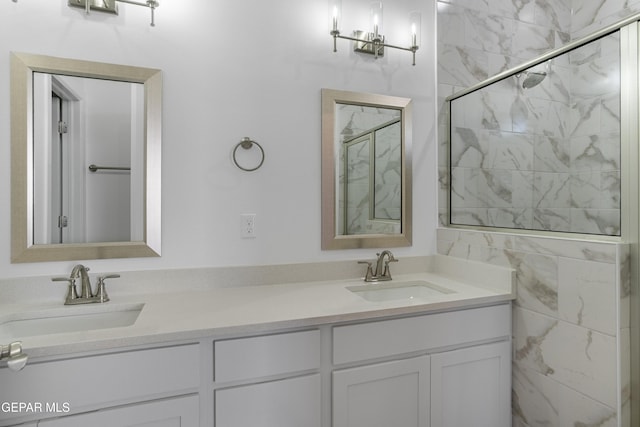 full bath with double vanity, a shower, and a sink