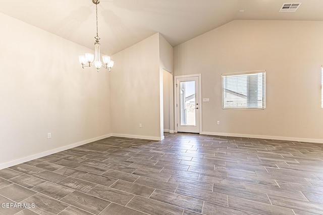 empty room featuring lofted ceiling, visible vents, baseboards, an inviting chandelier, and dark wood-type flooring