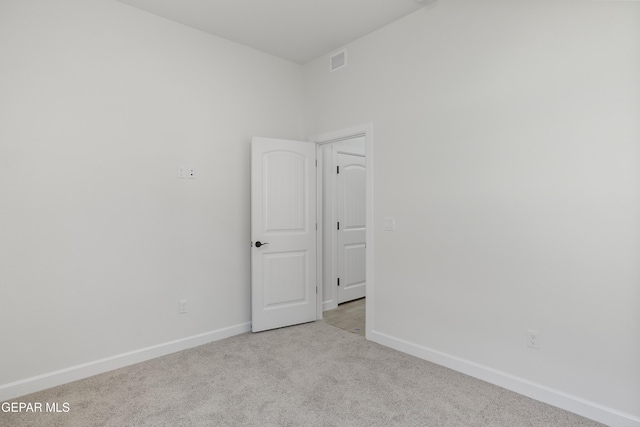 813 Durham Way, Horizon City, TX 79928 - spare room featuring carpet, visible vents, and baseboards