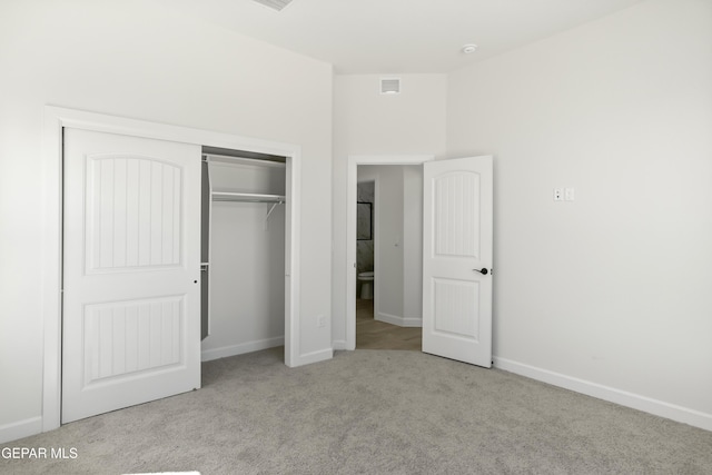 813 Durham Way, Horizon City, TX 79928 - unfurnished bedroom featuring visible vents, baseboards, carpet flooring, and a closet