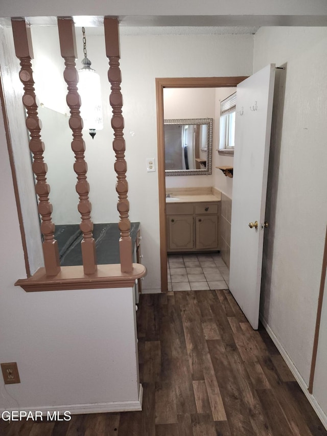 10850 Valle Grande Ct, El Paso, TX 79935 - hallway featuring wood finished floors