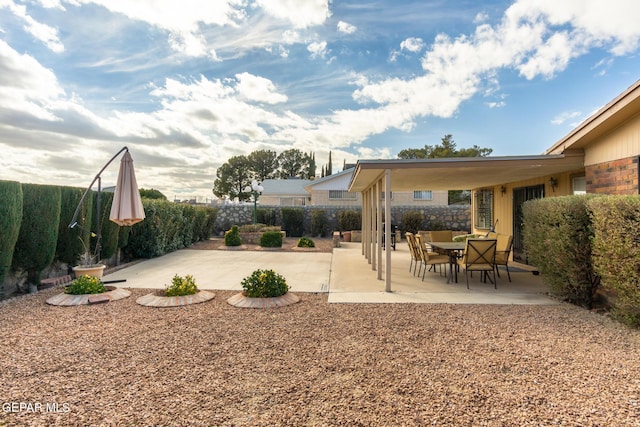 10850 Valle Grande Ct, El Paso, TX 79935 - fenced backyard featuring a patio