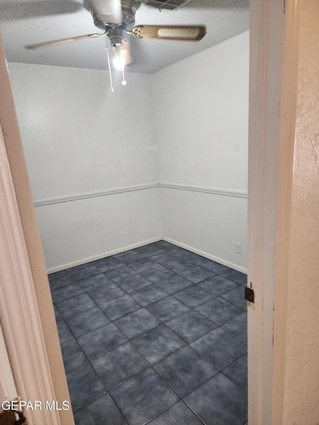 10850 Valle Grande Ct, El Paso, TX 79935 - empty room featuring ceiling fan and baseboards