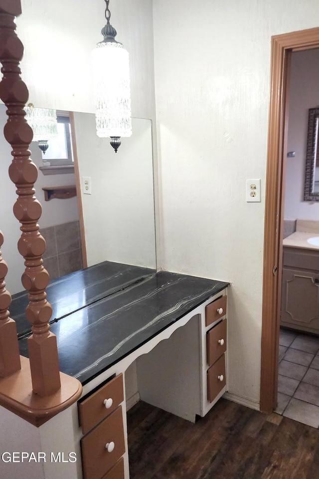 10850 Valle Grande Ct, El Paso, TX 79935 - bathroom featuring wood finished floors and vanity