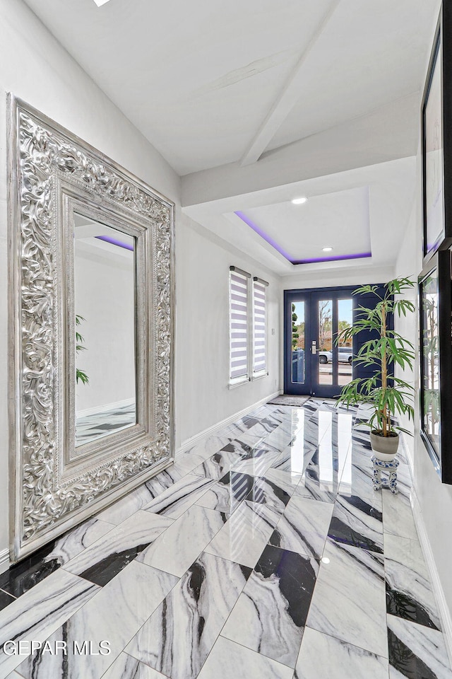 701 La Cruz Dr, El Paso, TX 79902 - interior space featuring french doors, a tray ceiling, and baseboards