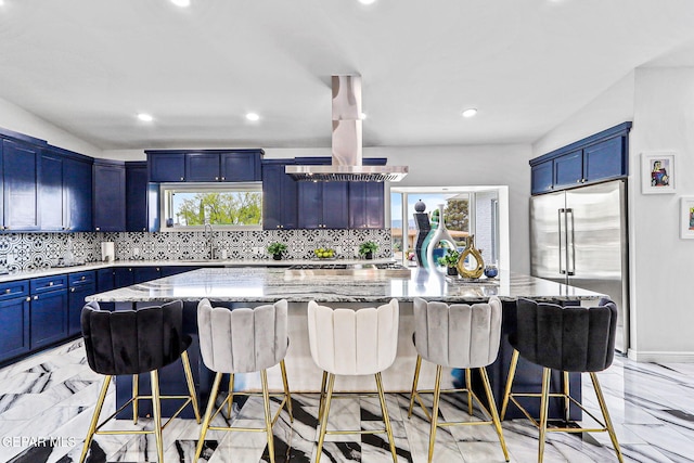701 La Cruz Dr, El Paso, TX 79902 - kitchen featuring blue cabinets, marble finish floor, light stone counters, and appliances with stainless steel finishes