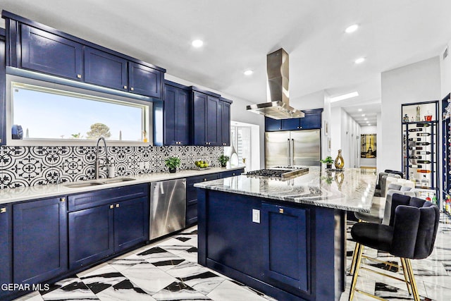 701 La Cruz Dr, El Paso, TX 79902 - kitchen with a kitchen bar, blue cabinets, island exhaust hood, a sink, and stainless steel appliances