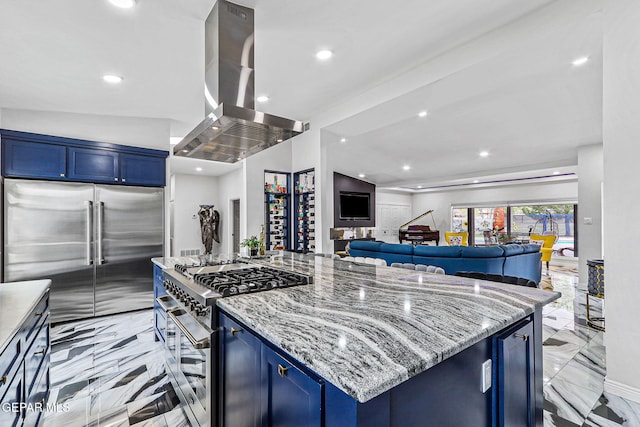 701 La Cruz Dr, El Paso, TX 79902 - kitchen featuring island range hood, marble finish floor, blue cabinets, and premium appliances