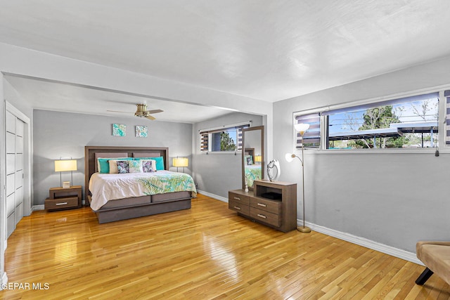 701 La Cruz Dr, El Paso, TX 79902 - bedroom featuring light wood-style floors, baseboards, and a ceiling fan