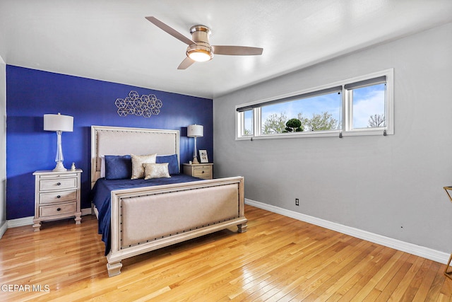 701 La Cruz Dr, El Paso, TX 79902 - bedroom with light wood-type flooring, baseboards, and a ceiling fan