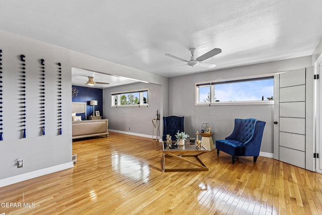 701 La Cruz Dr, El Paso, TX 79902 - living area featuring ceiling fan, hardwood / wood-style floors, and a healthy amount of sunlight