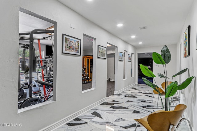 701 La Cruz Dr, El Paso, TX 79902 - hallway with marble finish floor, baseboards, visible vents, and recessed lighting