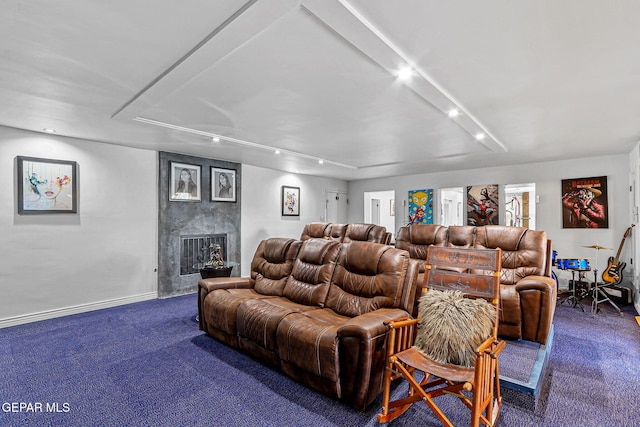 701 La Cruz Dr, El Paso, TX 79902 - cinema with track lighting, baseboards, carpet, and a high end fireplace