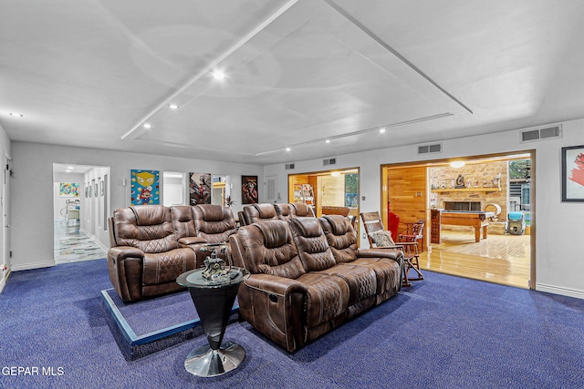 701 La Cruz Dr, El Paso, TX 79902 - carpeted home theater with a fireplace, visible vents, and baseboards
