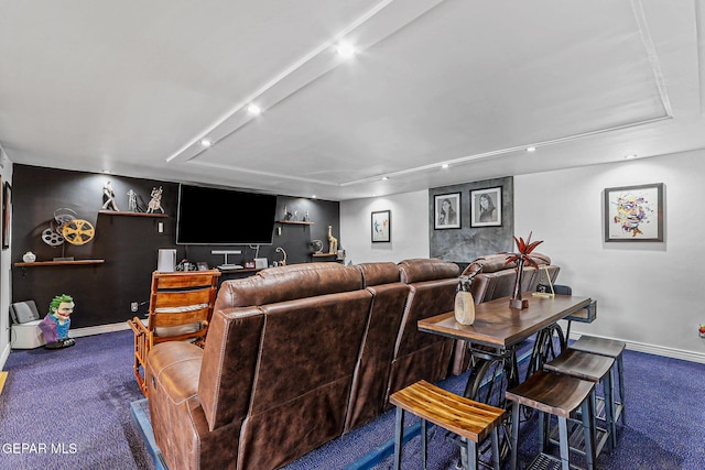 701 La Cruz Dr, El Paso, TX 79902 - living area featuring bar area, carpet, baseboards, and rail lighting