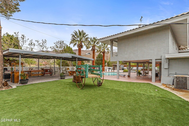 701 La Cruz Dr, El Paso, TX 79902 - view of yard with a patio area, fence, central AC unit, and a fenced in pool