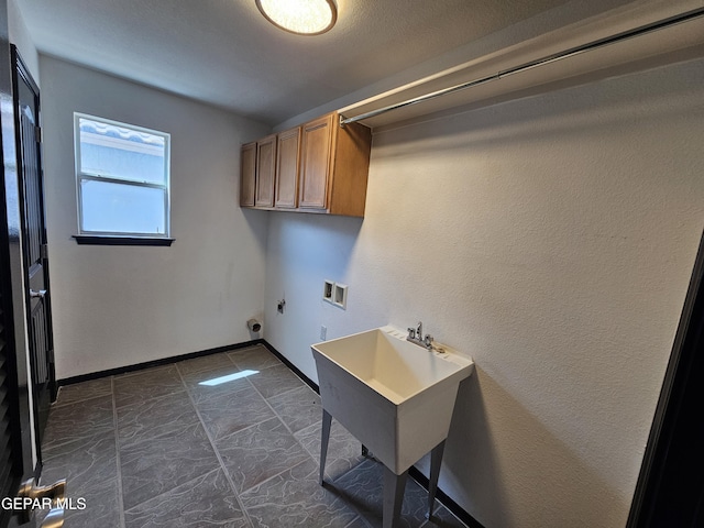 3864 Tierra Campa Dr, El Paso, TX 79938 - clothes washing area with hookup for a washing machine, hookup for an electric dryer, a sink, baseboards, and cabinet space
