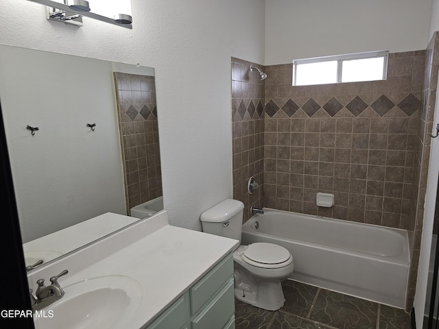 3864 Tierra Campa Dr, El Paso, TX 79938 - bathroom with toilet, vanity, marble finish floor, and shower / bathtub combination