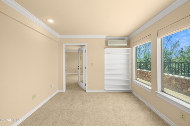 carpeted empty room featuring ornamental molding, baseboards, and an AC wall unit