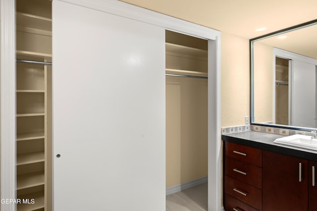 closet featuring a sink