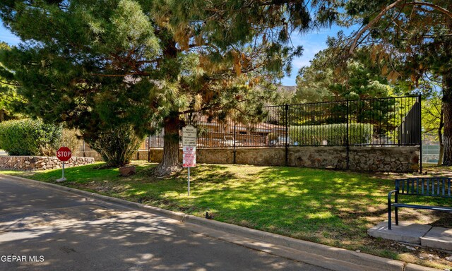 exterior space featuring a yard and fence
