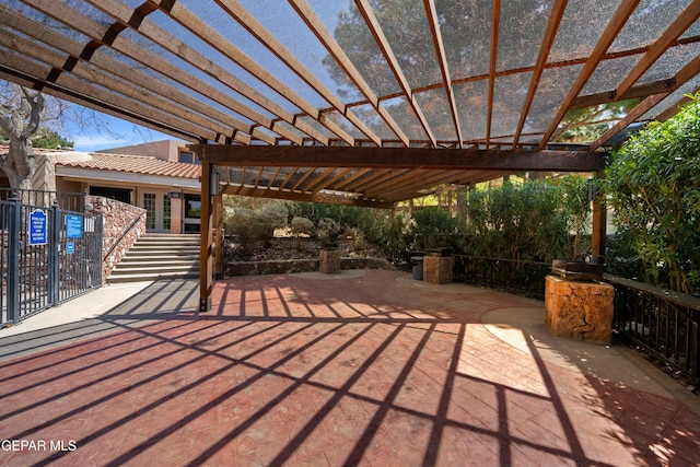 view of patio featuring a pergola