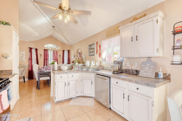 kitchen featuring white cabinets, range with gas cooktop, dishwasher, a sink, and a peninsula