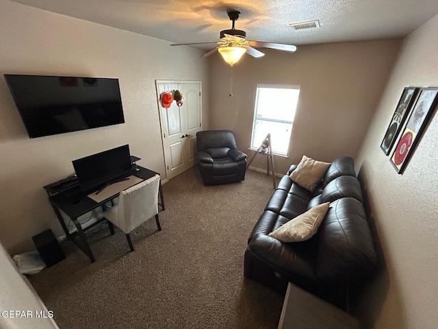 1250 Franklin Raven Place, El Paso, TX 79912 - living area with carpet flooring, visible vents, and a ceiling fan