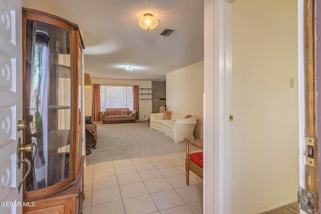 10632 Park View Cir, El Paso, TX 79935 - interior space with light tile patterned flooring, light colored carpet, and visible vents