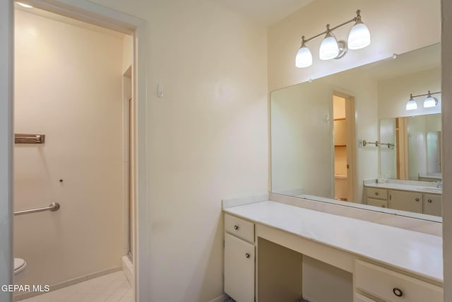 10632 Park View Cir, El Paso, TX 79935 - full bath with vanity, baseboards, tile patterned floors, toilet, and a shower with shower door