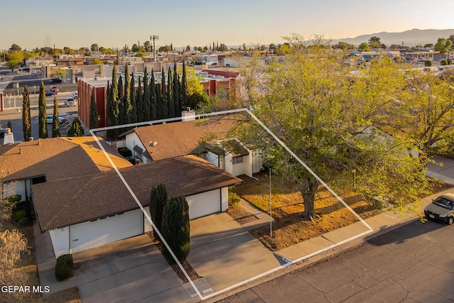 10632 Park View Cir, El Paso, TX 79935 - aerial view at dusk with a residential view