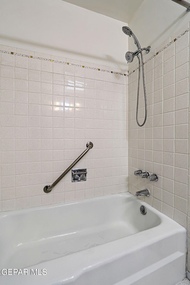 full bath featuring bathing tub / shower combination