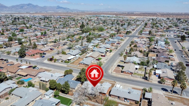 drone / aerial view with a mountain view and a residential view