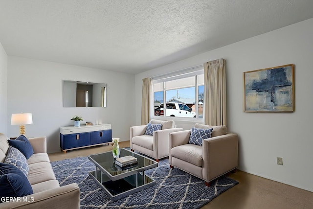 living area featuring a textured ceiling
