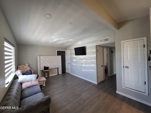 144 Marquita Ln, El Paso, TX 79915 - living area with dark wood finished floors, baseboards, vaulted ceiling with beams, and visible vents