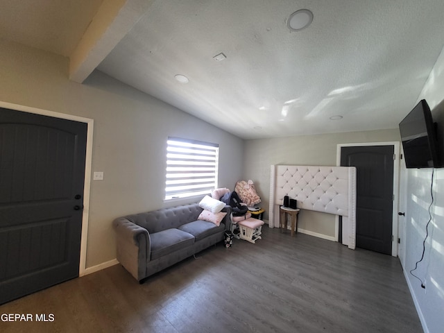 144 Marquita Ln, El Paso, TX 79915 - living room with baseboards, vaulted ceiling with beams, wood finished floors, and a textured ceiling