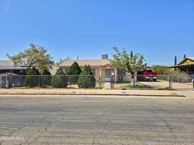 7726 Monterrey Dr, El Paso, TX 79915 - obstructed view of property with a fenced front yard