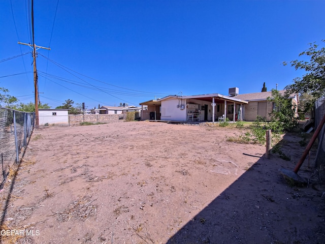 7726 Monterrey Dr, El Paso, TX 79915 - view of yard with fence and central air condition unit