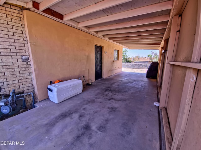 7726 Monterrey Dr, El Paso, TX 79915 - view of side of property with a patio area and stucco siding