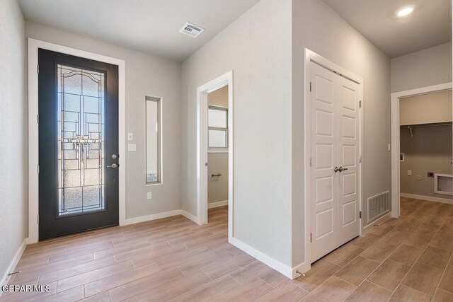 3840 Peak Pl, El Paso, TX 79938 - entrance foyer featuring light wood finished floors, baseboards, and visible vents